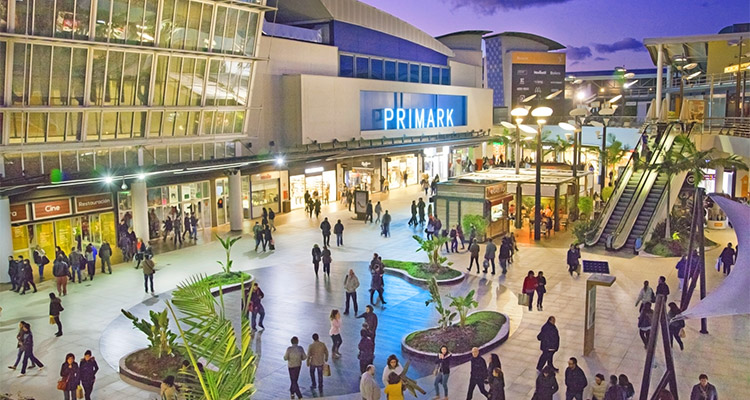 I benefici di Vernice Pittura come Fotosan Caspani per un Centro Commerciale